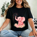 Cute pink elephant, heart, and floral print loose-fit plus-size women's cotton T-shirt with a round neck and short sleeves—suitable for casual daily wear, vacations, and lounging at home.